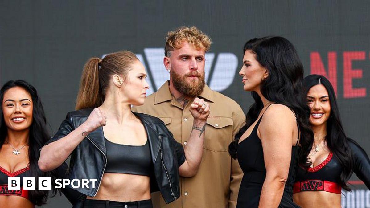 Ronda Rousey and Gina Carano face off either side of Jake Paul