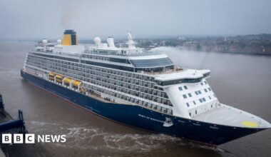 A view from a high vantage point, looking down on Spirit of Discovery as the ship leaves Tilbury on a misty day