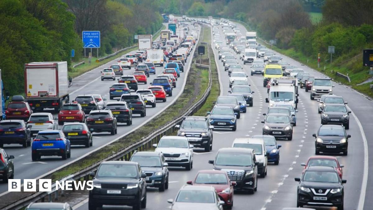 Hundreds of cars queuing in both directions on a British motorway