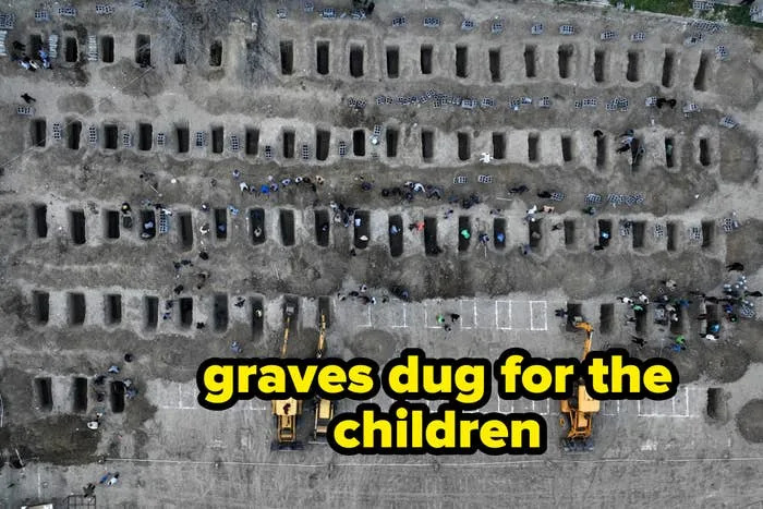 Aerial view of graves with workers and excavators; a significant number of burial sites arranged in rows