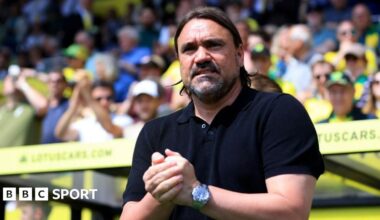 Daniel Farke, with raised right arm, on the touchline during a play-off game between Norwich and Leeds at Carrow Road in 2024