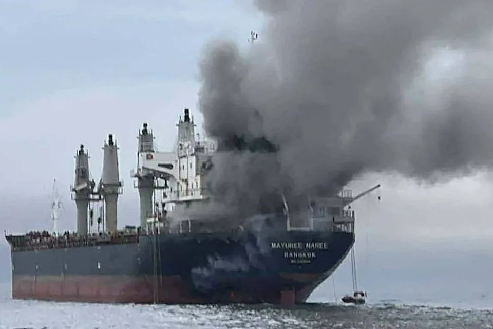 Smoke rising from the Thai bulk carrier 'Mayuree Naree' near the Strait of Hormuz after an attack. / HANDOUT / ROYAL THAI NAVY/AFP via Getty Im
