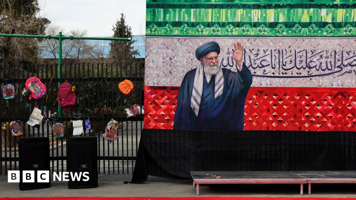 Women prepare a makeshift memorial in tribute to Iran's late Supreme Leader Ayatollah Ali Khamenei on a street in Tehran, Iran (4 March 2026)