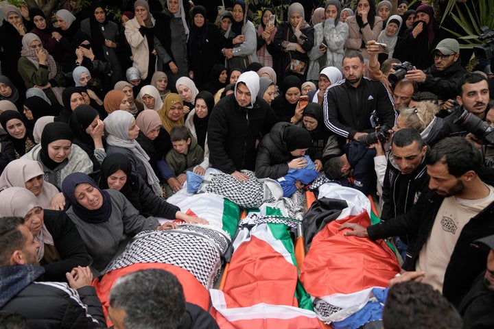 Palestinians mourn at the funeral of four members of the Odeh family who were killed in their car by Israeli security forces during an army operation in Tammun, West Bank, Sunday, March 15, 2026. (AP Photo/Majdi Mohammed)