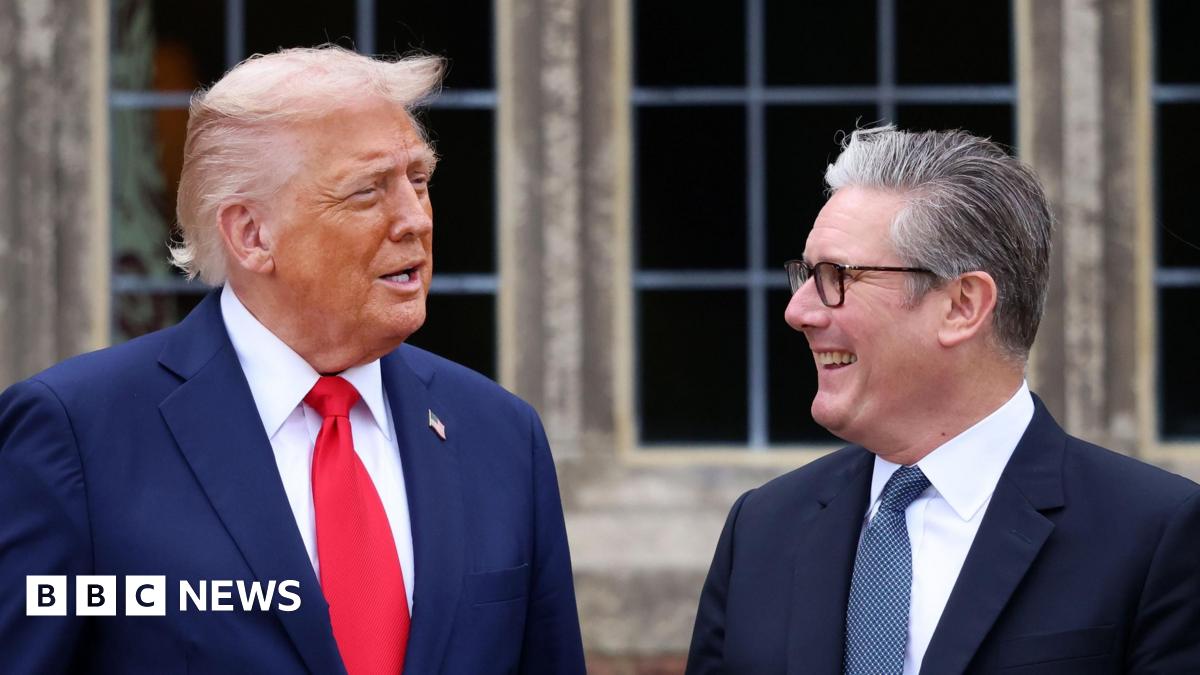 US President Donald Trump with British Prime Minister Sir Keir Starmer in September 2025. Trump wears a blue jacket, red tie and a gold pin featuring the American flag. Starmer wears a blue jacket, blue patterned tie and his customary black-rimmed glasses.