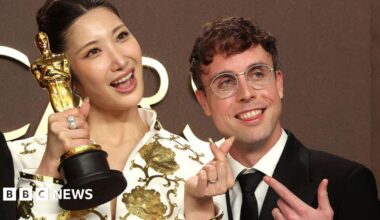Golden songwriters Ejae and Mark Sonnenblick winners of the Best Original Song for "Golden" from “KPop Demon Hunters" pose in the press room during the 98th Oscars at Dolby Theatre.