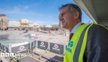 Business and Trade Secretary Peter Kyle wearing a hi-vis vest during a visit to Tata Steel's Port Talbot plant.