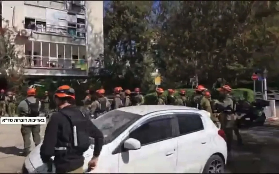 Emergency services on the streets of Tel Aviv on Friday as the explosives fell on the city