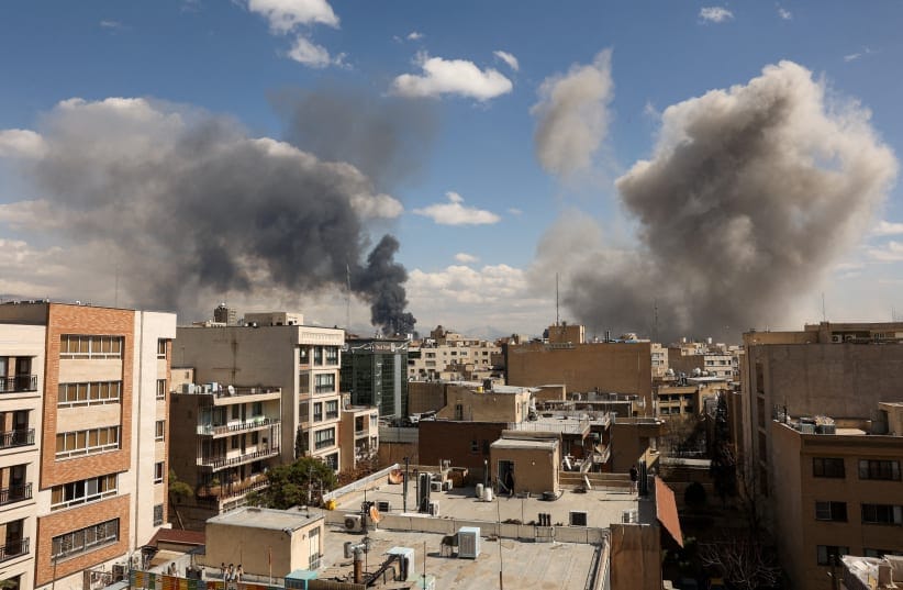 Smoke rises following an explosion, after Israel and the US launched strikes on Iran, in Tehran, Iran, March 1, 2026