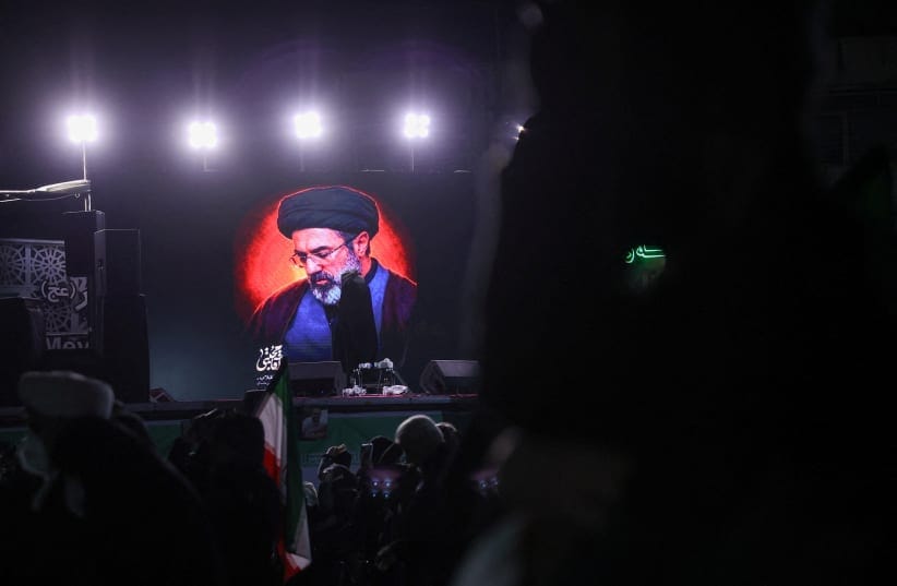 A picture of Iran's new supreme leader, Mojtaba Khamenei, is displayed on a screen in Tehran, March 9, 2026.