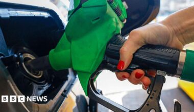 A motorist refuels a vehicle with unleaded petrol at a Jet petrol station, a subsidiary of Phillips 66, in Brentford, north west of London.