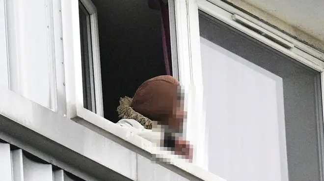 The police warned the public to avoid the area following "reports of a man with a bladed weapon".