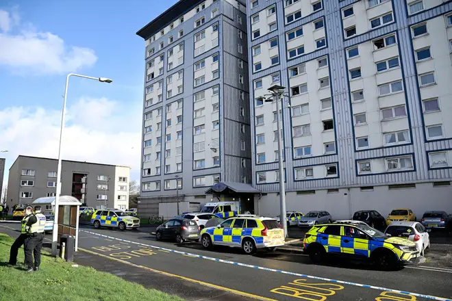 Police at the scene in Calder, Edinburgh, after police warned the public to avoid the area following "reports of a man with a bladed weapon". Picture date: Monday March 2, 2026.