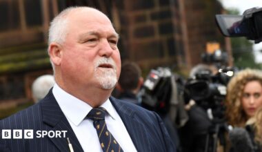 Mike Gatting, wearing a shirt and tie
