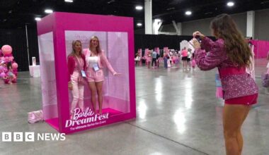 Barbie Dream Fest attendees take a photo