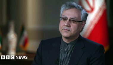 Black and white photograph of armed police on the adjoining balcony to the Iranian Embassy, when units of the Special Air Service (SAS) helped police end the six day siege at the building