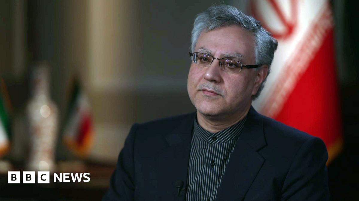 Black and white photograph of armed police on the adjoining balcony to the Iranian Embassy, when units of the Special Air Service (SAS) helped police end the six day siege at the building