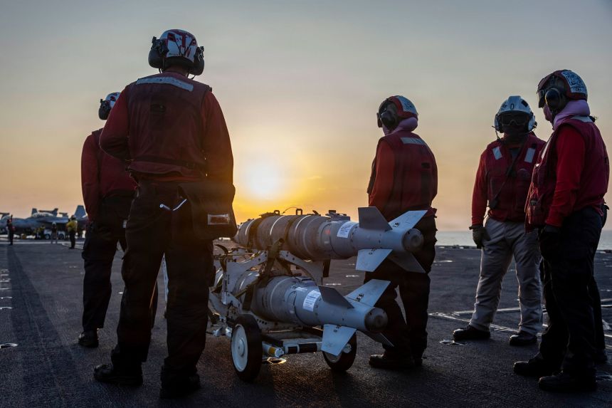 US sailors on the flight deck of the aircraft carrier USS Abraham Lincoln, on March 4.