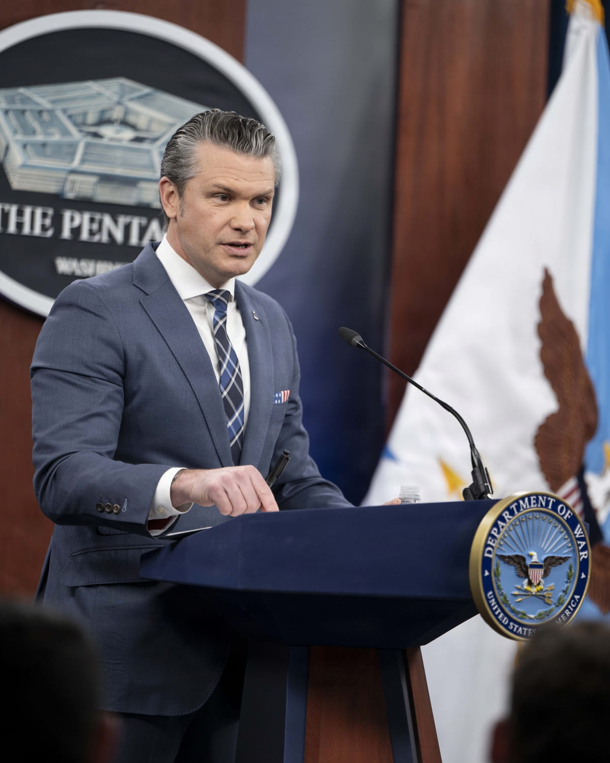 Secretary of War Pete Hegseth and Chairman of the Joint Chiefs of Staff U.S. Air Force Gen. Dan Caine conduct a press briefing about Operation Epic Fury at the Pentagon, Washington, D.C., March 19, 2026. (DoW photo by U.S. Air Force Staff Sgt. Madelyn Keech)