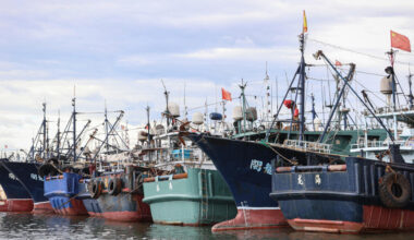 Thousands of Chinese boats mass at sea, raising questions