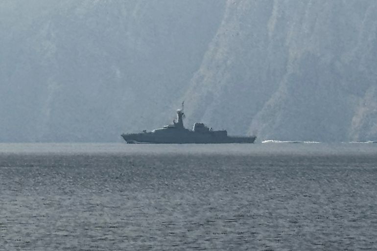 A navy vessel is seen sailing in the Strait of Hormuz