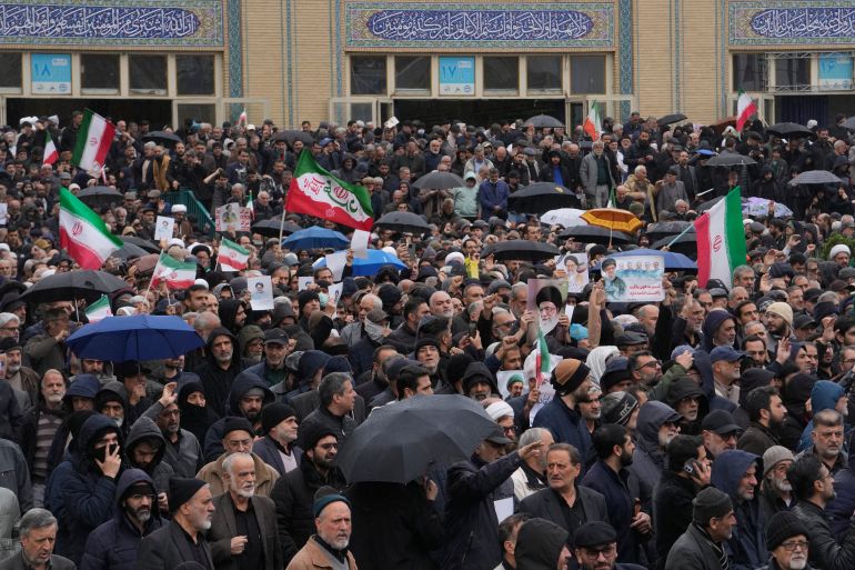 Iranians attend the funeral procession of Iran's intelligence minister Esmail Khatib and his family, killed in US-Israeli attacks, at the Imam Khomeini Grand Mosque in Tehran, Iran, Friday, March 20, 2026. [Vahid Salemi/AP Photo]