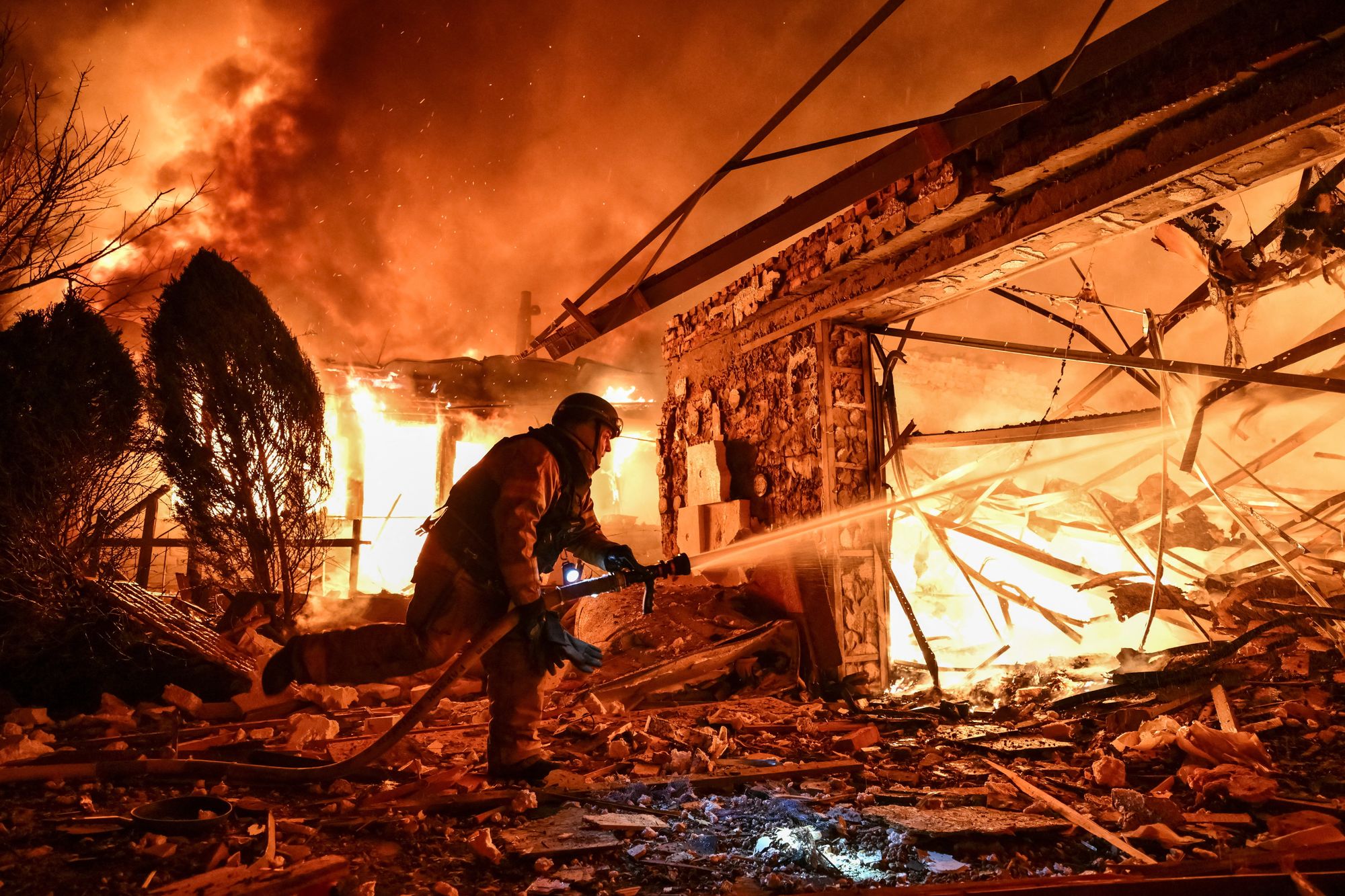 A firefighter works at the site of buildings hit by a Russian drone strike, amid Russia's attack on Ukraine, in Zaporizhzhia, Ukraine March 16, 2026