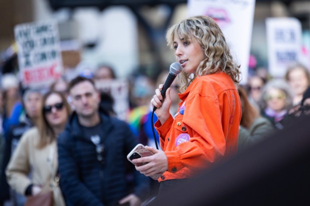 Congressional candidate Katherine "Kat" Abughazaleh speaks to the crowd during a Women's Day march at Daley Plaza in Chicago's Loop, March 8, 2026. (Josh Boland/Chicago Tribune)