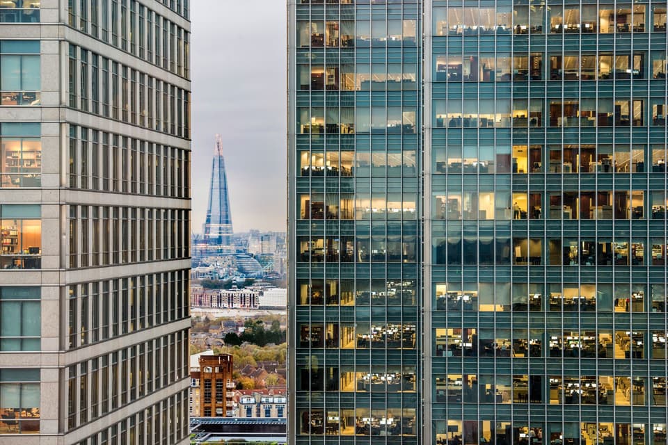The shard pictured between two high-rise office buildings in the city