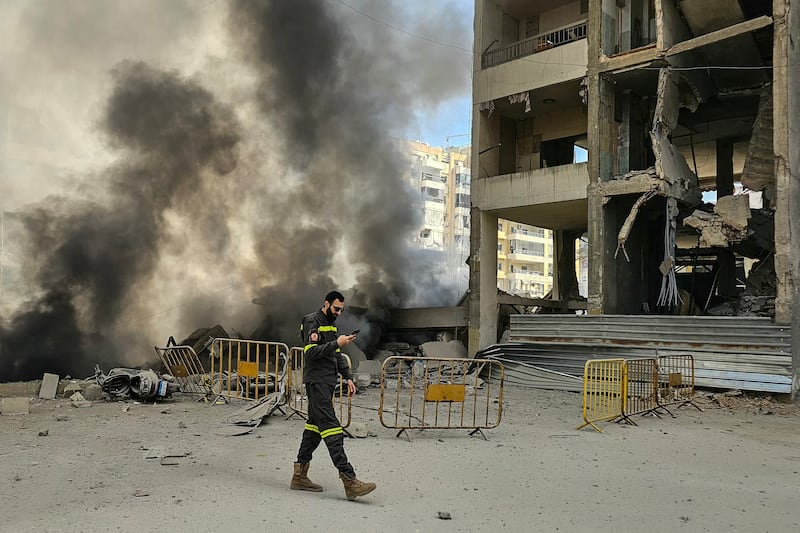 A member of the civil defence at the site of overnight Israeli airstrikes in the southern suburbs of Beirut. Photograph: AFP via Getty Images