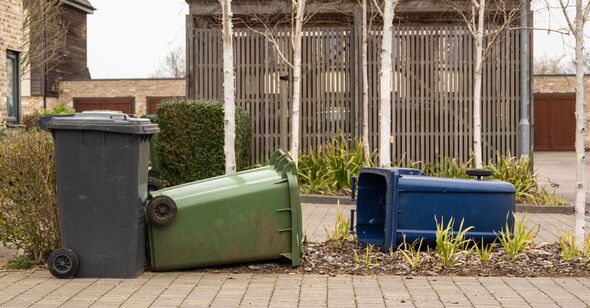 Wheelie bins on their sides Wheelie bins on their sides
