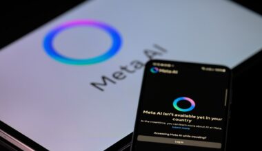 The Meta AI app is displayed on a mobile phone with the Meta AI logo visible on a tablet in this photo illustration