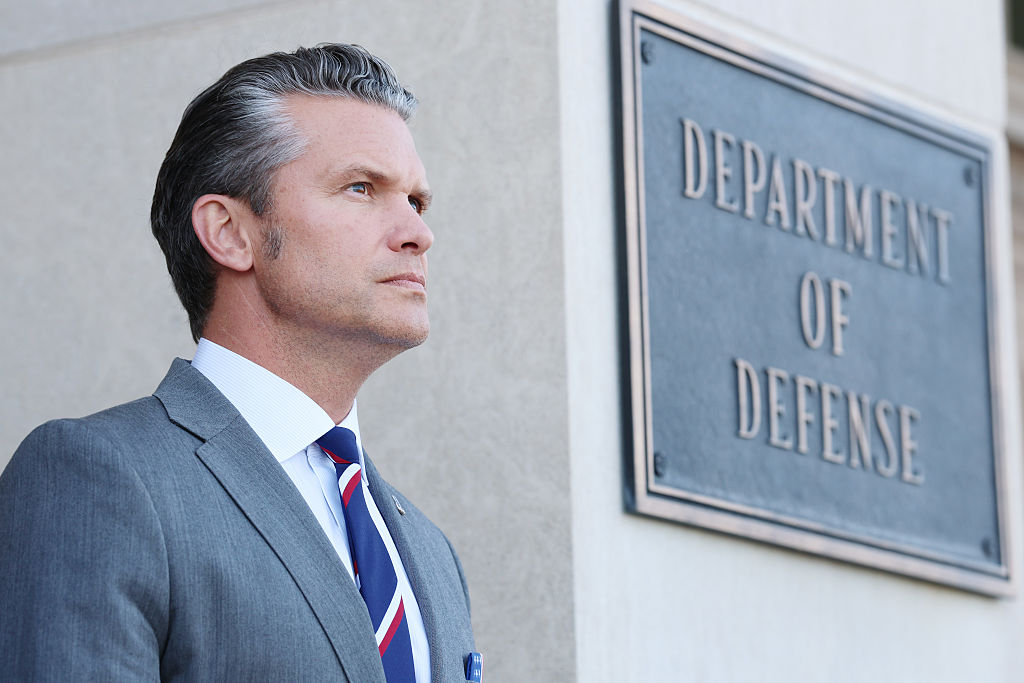 U.S. Secretary of War Pete Hegseth stands at attention during an advanced honor cordon for Canadian National Defense Minister David McGuinty at the Pentagon on September 22, 2025 in Arlington, Virginia. (Anna Moneymaker / Getty Images)