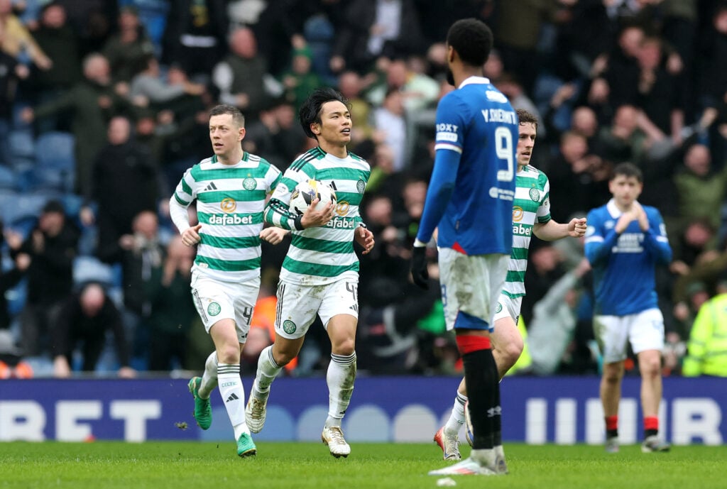 Reo Hatate of Celtic celebrates scoring his team's second goal during the William Hill Premiership match between Rangers and Celtic
