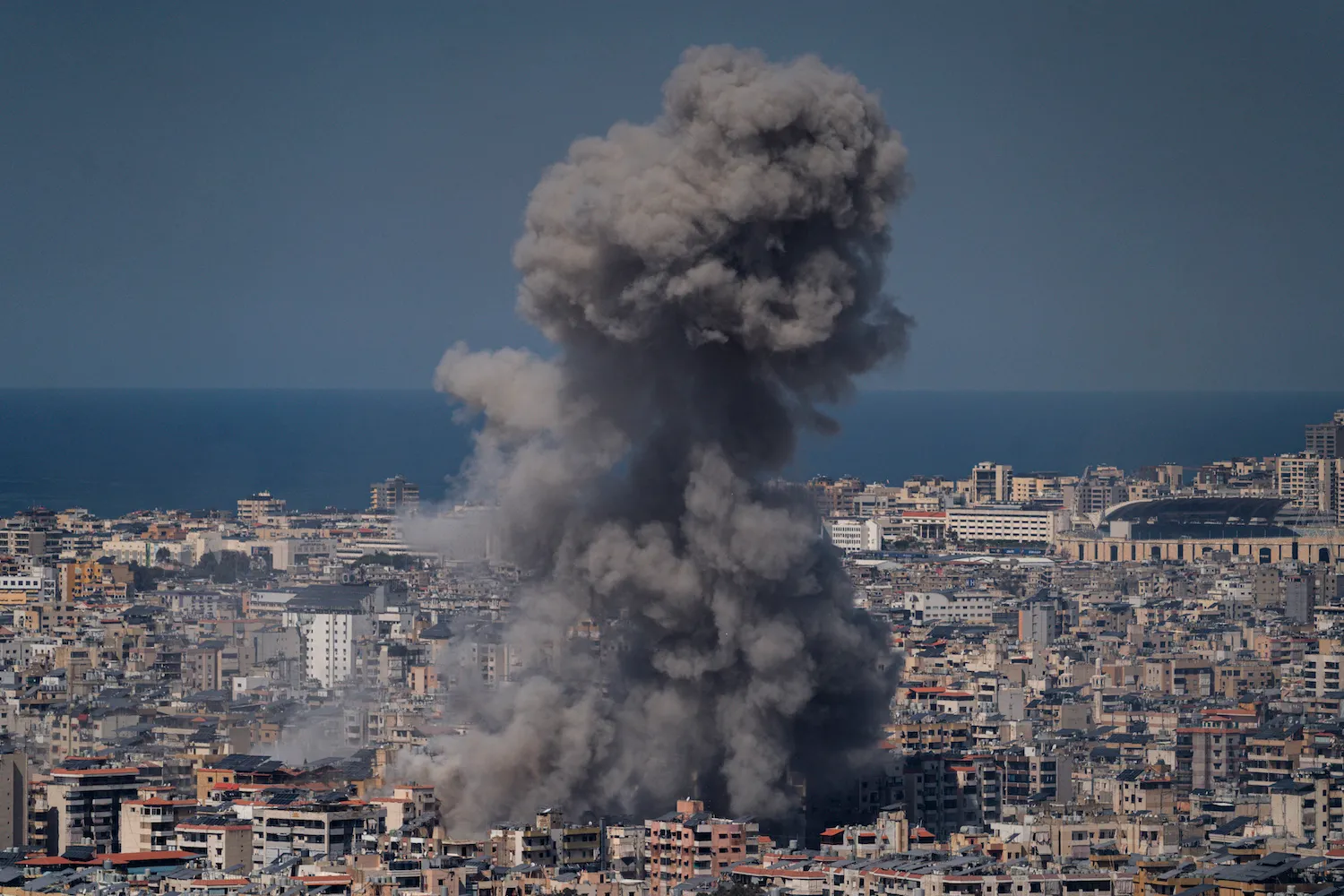 Smoke rises from a building hit in a bombing in Beirut, Lebanon, as Israel continues its aerial and ground assault against Hezbollah, on March 11.