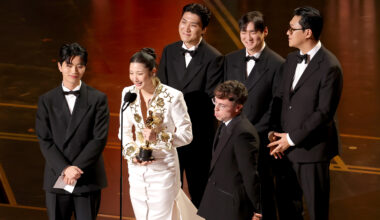 From left: Yuhan, EJAE, ZHUN, Mark Sonnenblick, NHD and 24 accept the Original Song award for "KPop Demon Hunters" onstage during the 98th Oscars at Dolby Theatre on March 15, 2026 in Hollywood, California.