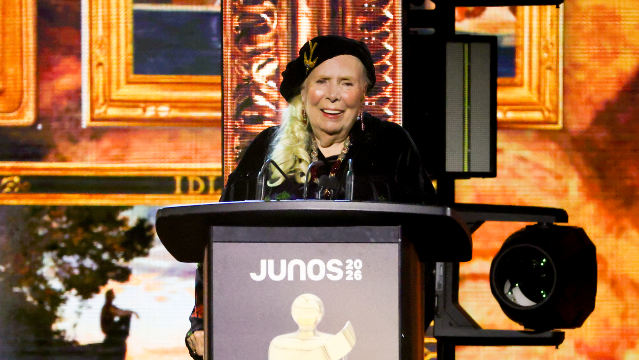 Joni Mitchell accepts the Lifetime Achievement award onstage during the 2026 JUNO Awards.