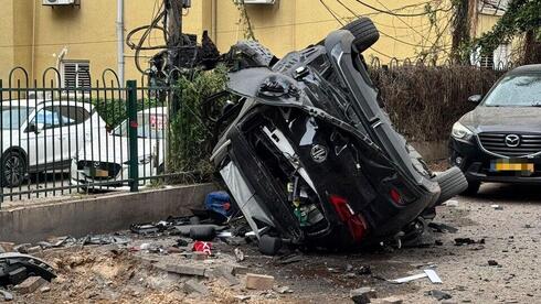 Iran missile barrage hits central Israel with banned cluster munition; woman lightly