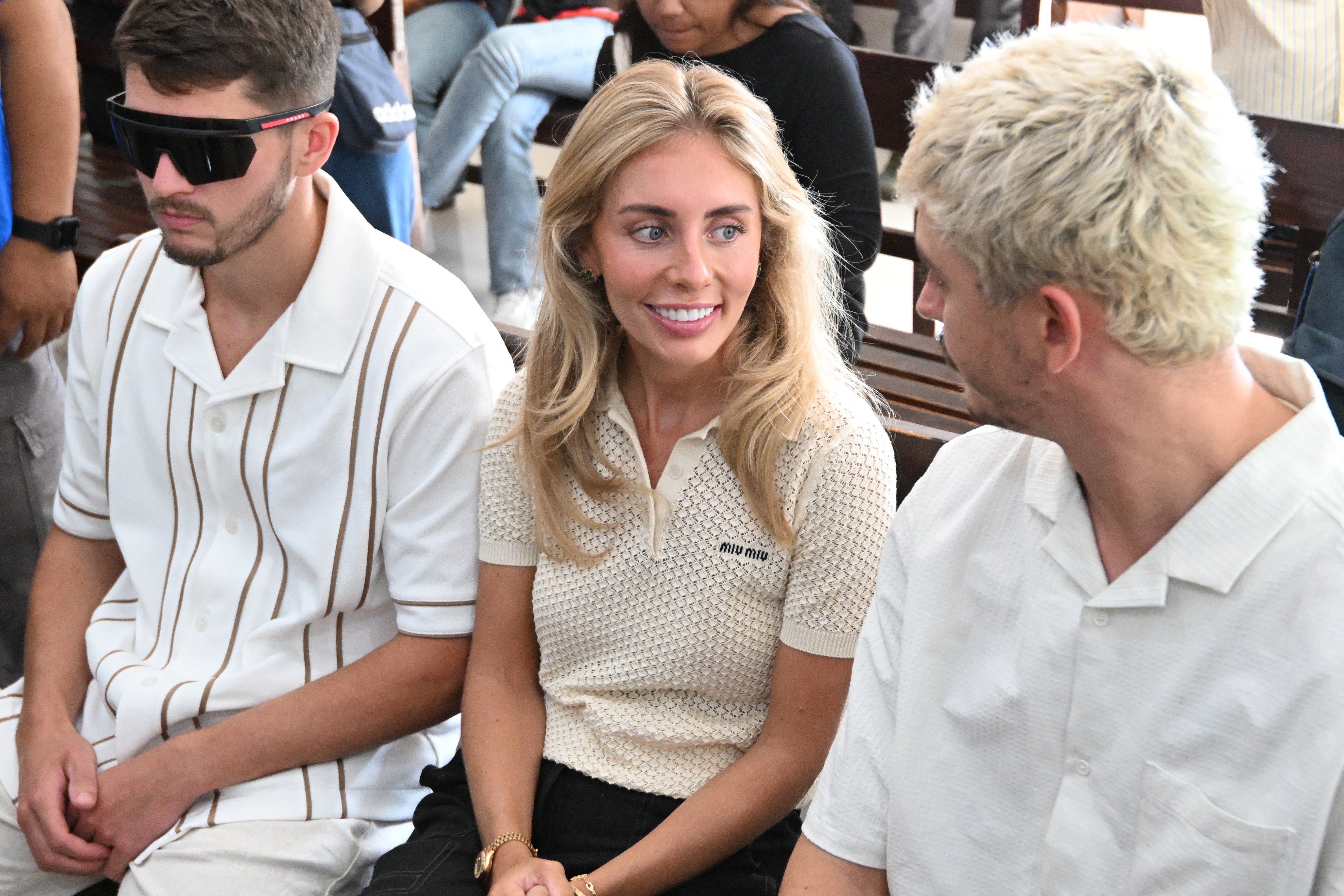 British adult content creator Tia Billinger (C), known as ‘Bonnie Blue’, attends her trial at court in Denpasar, on Indonesia resort island of Bali on December 12, 2025