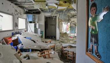 Israeli authorities said five people were injured when a kindergarten was hit by fragments of an Iranian missile in Rishon LeZion, Israel, Saturday, March 21, 2026.