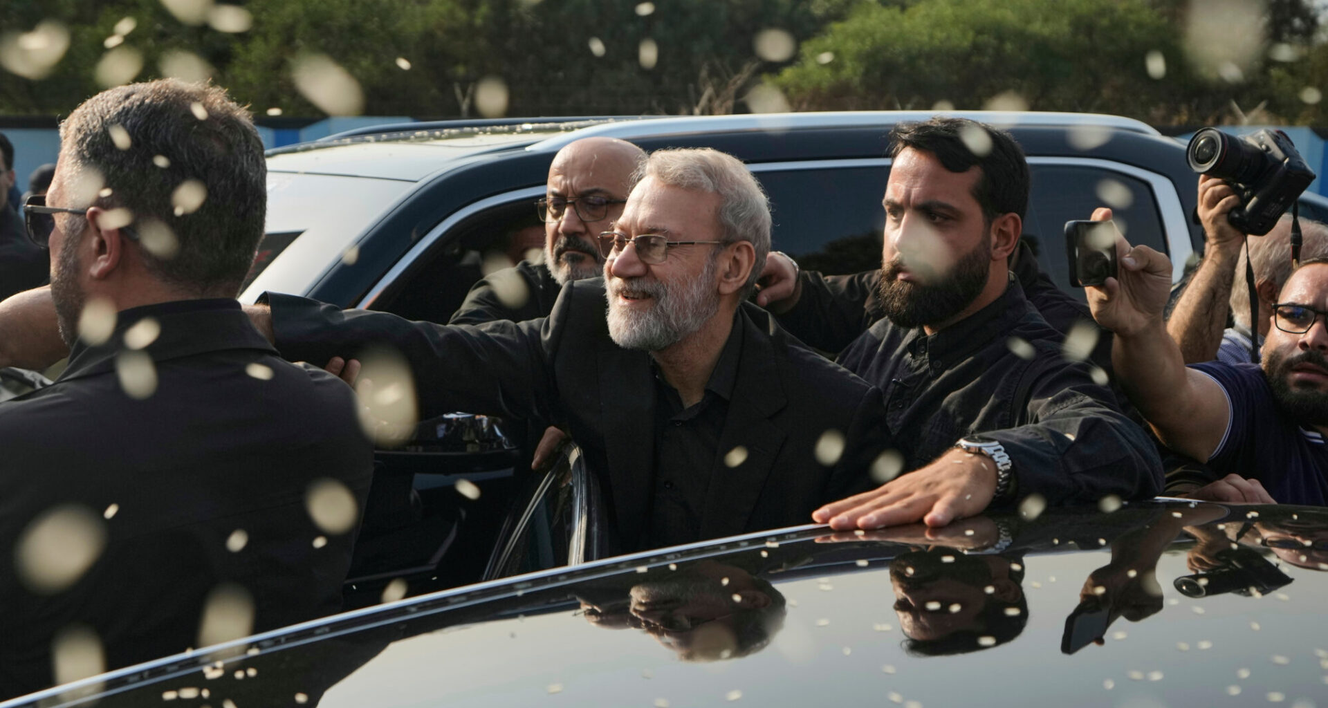 FILE - Ali Larijani, center, secretary of Iran's Supreme National Security Council, gestures as Hez...
