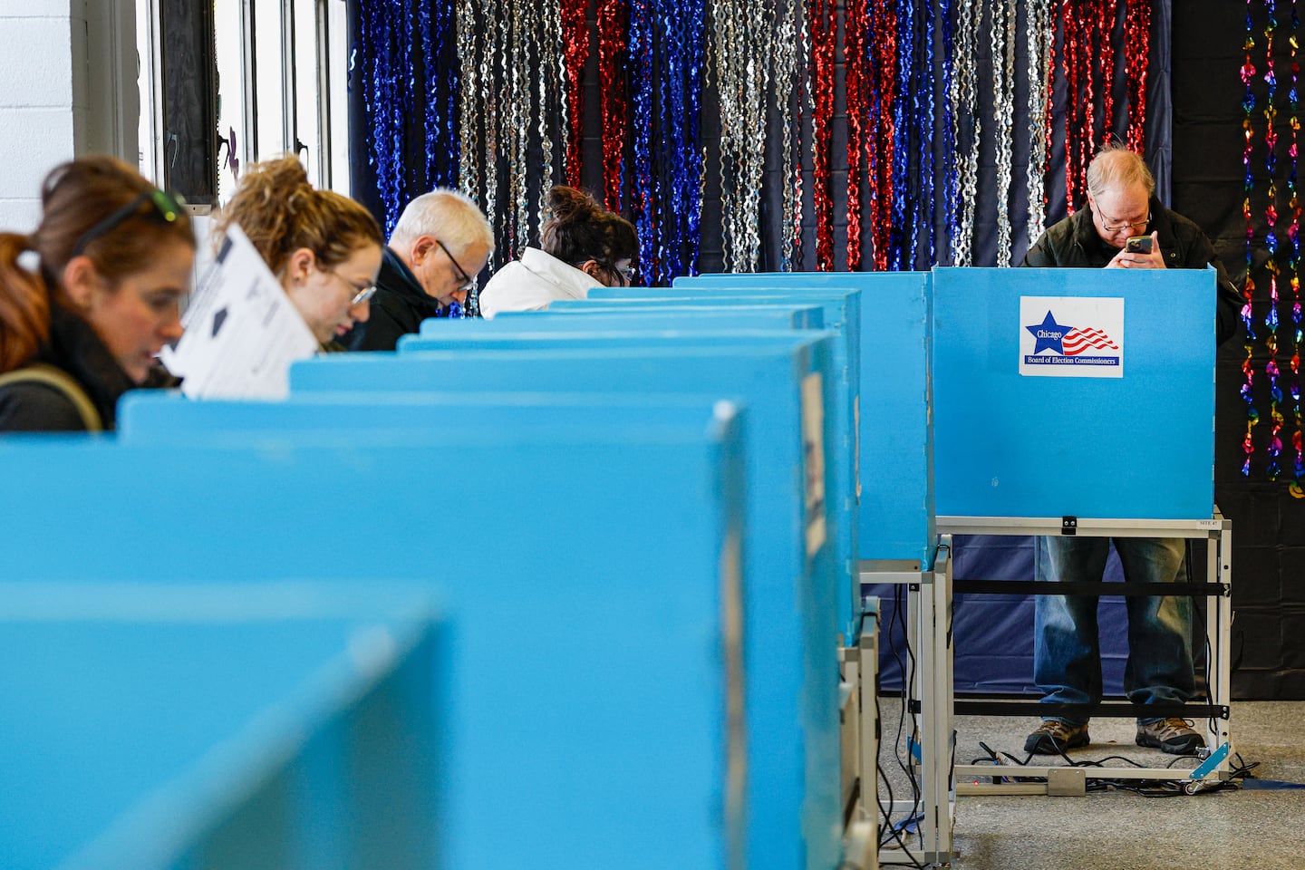 People cast their votes in Chicago on March 17 for a primary election.