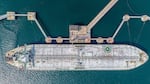 A oil tanker is docked unloading crude oil at the port in Qingdao, in China's eastern Shandong province, on March 25, 2026.
