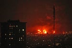 Flames rise from an oil storage facility south of the capital Tehran as strikes hit the city during the U.S.–Israel military campaign, Iran, Saturday, March 7, 2026.