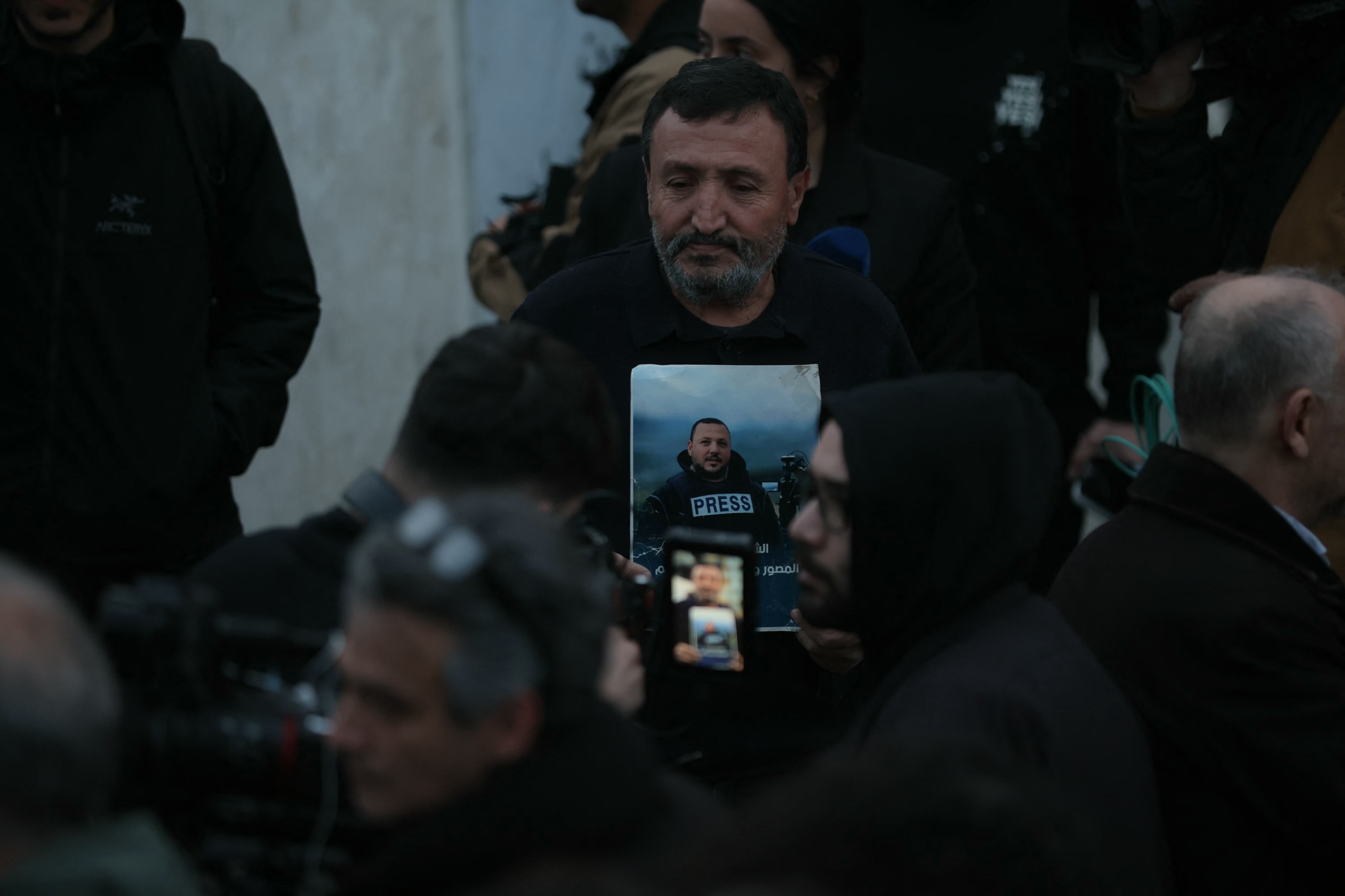 Lebanese journalists protest at Martyrs' Square in central Beirut against the killing of their colleagues from an Israeli strike