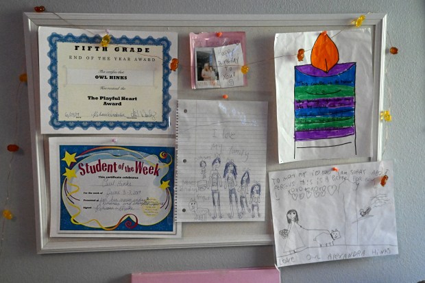 Awards for and artwork by Alexandra Hinks line the wall of her bedroom at her parents' home in San Rafael, Calif., on Thursday, March 19, 2026. She died by suicide in 2024 at the age of 16. (Alan Dep/Marin Independent Journal)