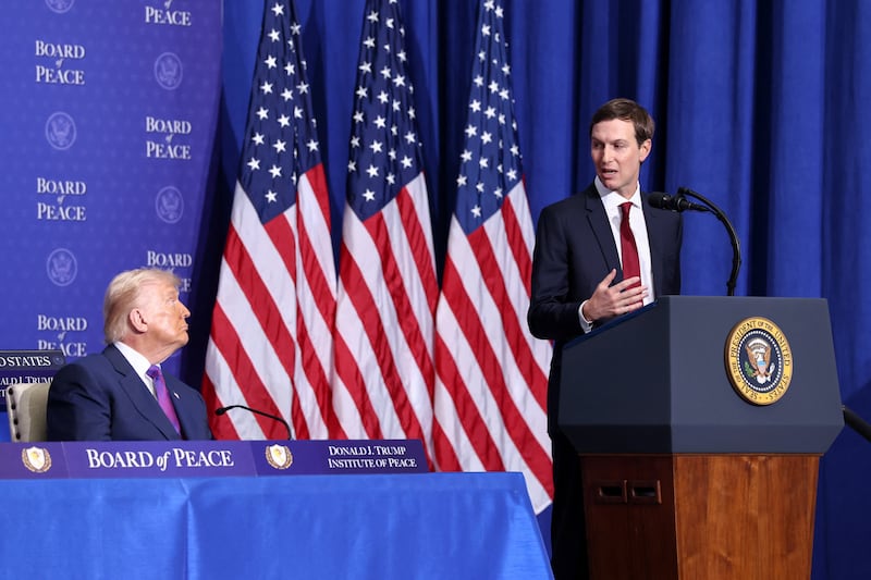U.S. President Donald Trump listens, as his son-in-law Jared Kushner speaks, during the inaugural Board of Peace meeting at the U.S. Institute of Peace in Washington, D.C., U.S., February 19, 2026. REUTERS/Kevin Lamarque