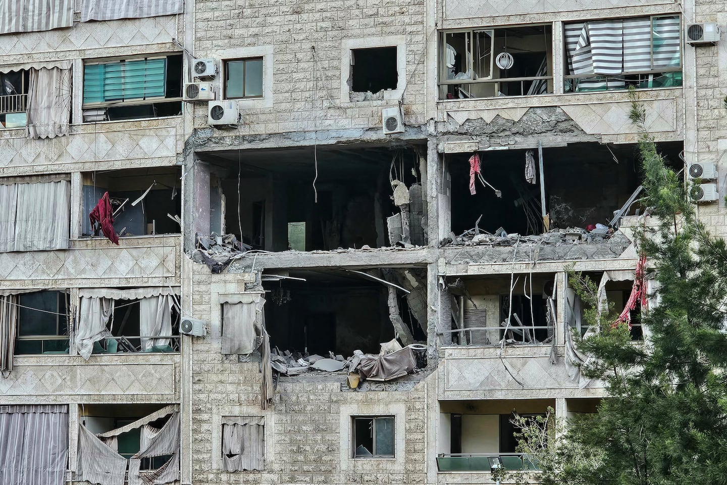 The damage after an overnight Israeli airstrike that targeted an apartment in the Burj al-Barajneh neighbourhood of Beirut's southern suburbs, on March 27.