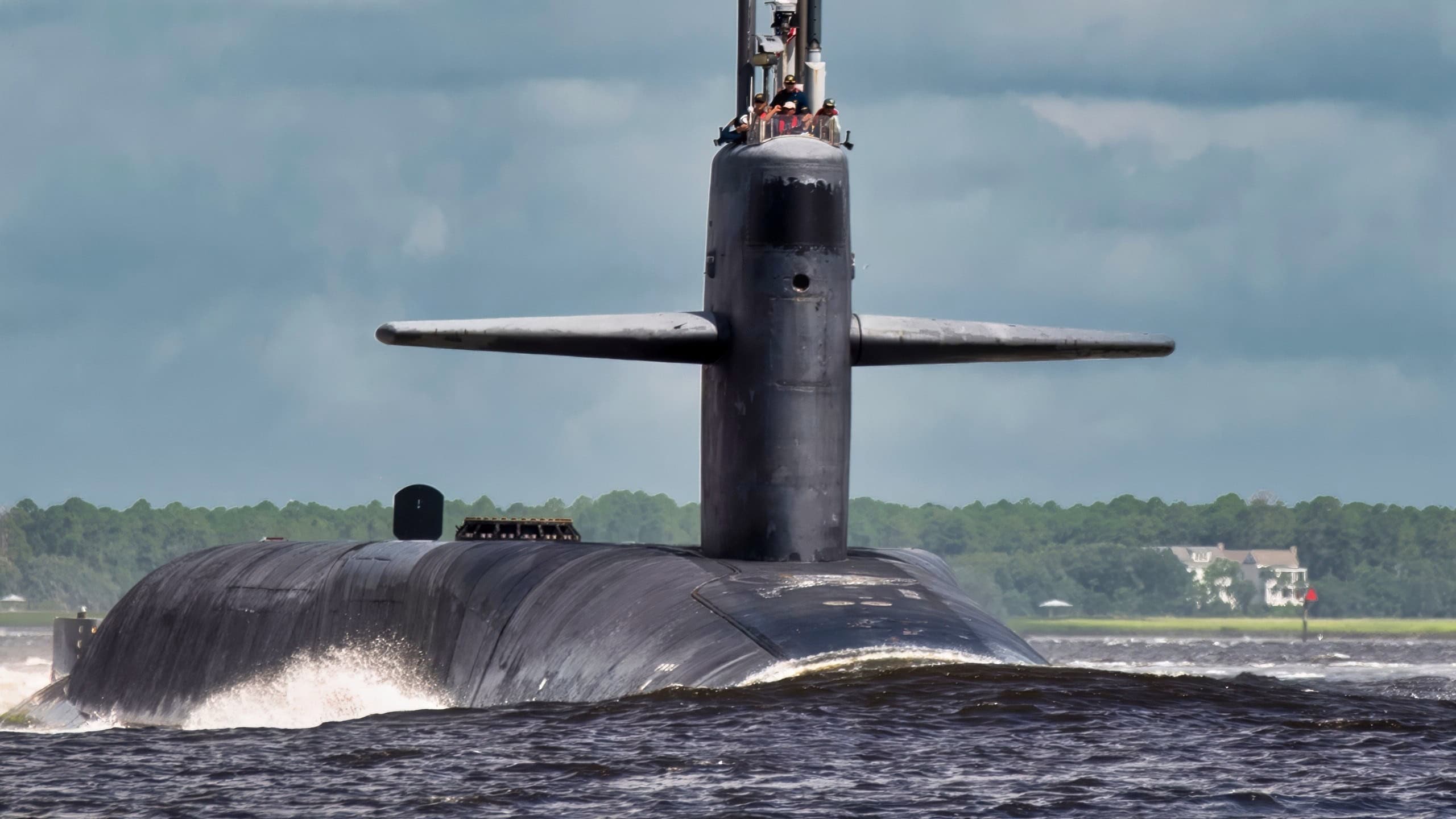 The Ohio-class guided-missile submarine USS Florida (SSGN 728) departs Naval Submarine Base Kings Bay. Florida will perform routine operations while at sea. (U.S. Navy photo by Mass Communication Specialist 1st Class James Kimber/Released)