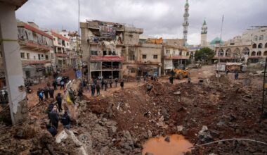People inspect the damage where Israel's military carried out an airborne operation that dropped troops overnight, in the town of Nabi Chit, Lebanon, March 7, 2026. REUTERS/ Mohammad Yassine